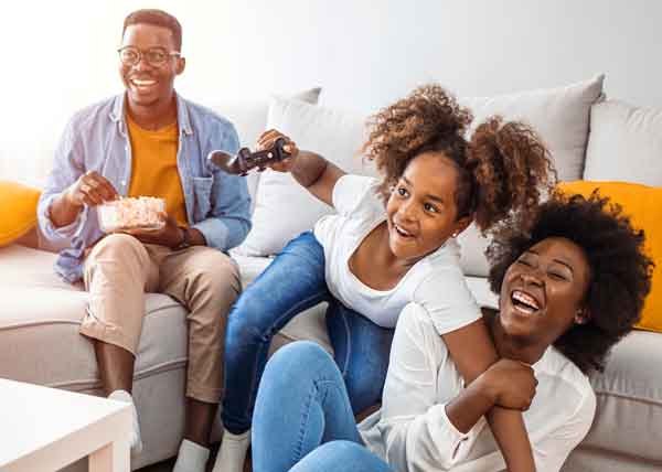 family watching TV in living room